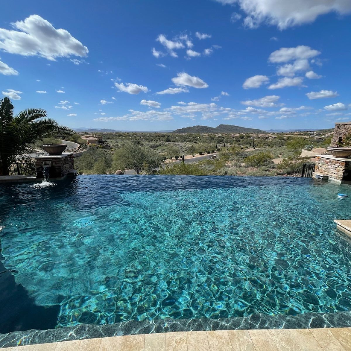 Sparkling infinity-edge pool with North Phoenix desert views